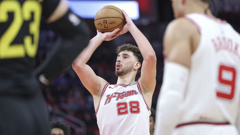 Jan 20, 2024; Houston, Texas, USA; Houston Rockets center Alperen Sengun (28) attempts a free throw during the fourth quarter against the Utah Jazz at Toyota Center. Mandatory Credit: Troy Taormina-USA TODAY Sports