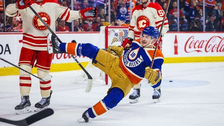 Jan 20, 2024; Calgary, Alberta, CAN; Edmonton Oilers left wing Zach Hyman (18) scores a goal against Calgary Flames during the third period at Scotiabank Saddledome. Mandatory Credit: Sergei Belski-USA TODAY Sports