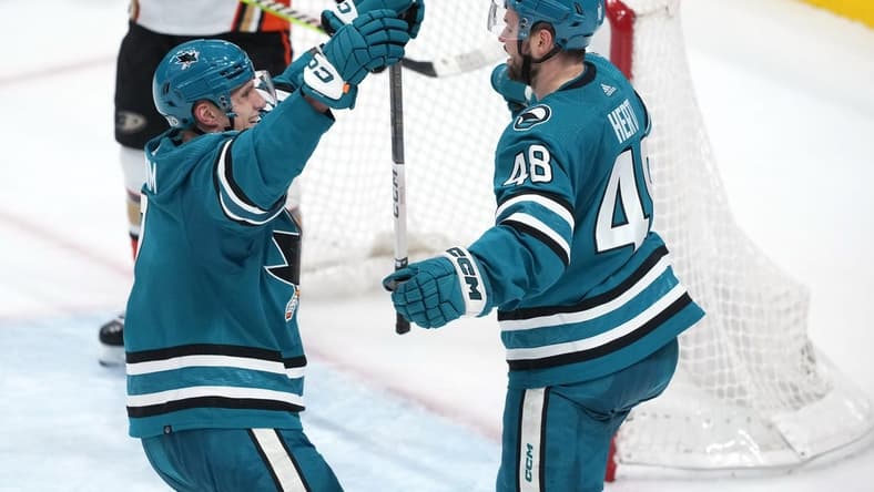 Jan 20, 2024; San Jose, California, USA; San Jose Sharks center Tomas Hertl (48) is congratulated by center Nico Sturm (left) after scoring a goal against the Anaheim Ducks during the third period at SAP Center at San Jose. Mandatory Credit: Darren Yamashita-USA TODAY Sports
