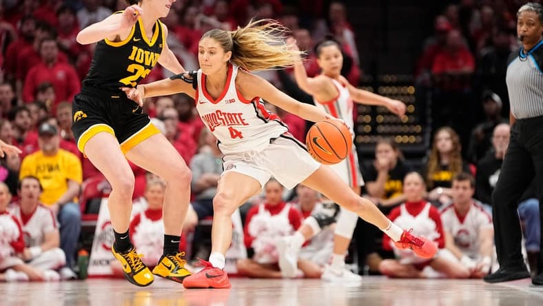 Jan 21, 2024; Columbus, Ohio, USA; Ohio State Buckeyes guard Jacy Sheldon (4) dribbles past Iowa Hawkeyes guard Caitlin Clark (22) during the NCAA women   s basketball game at Value City Arena.