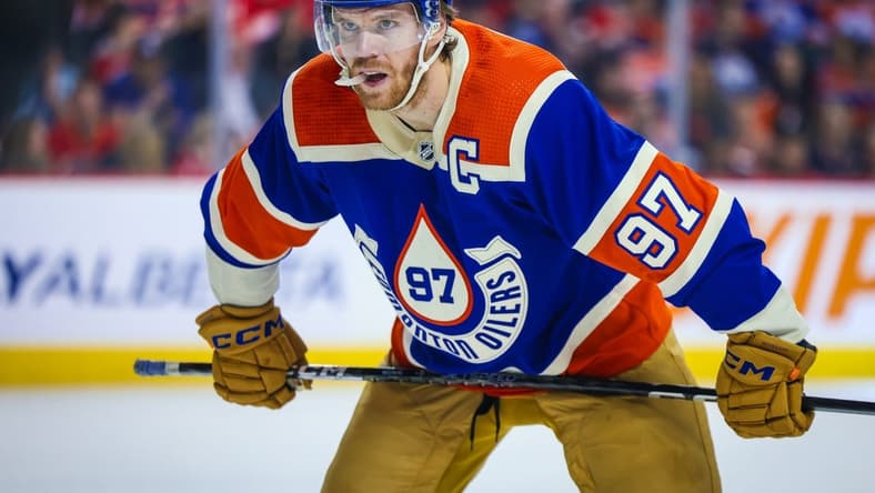 Jan 20, 2024; Calgary, Alberta, CAN; Edmonton Oilers center Connor McDavid (97) during the face off against the Calgary Flames during the first period at Scotiabank Saddledome. Mandatory Credit: Sergei Belski-USA TODAY Sports