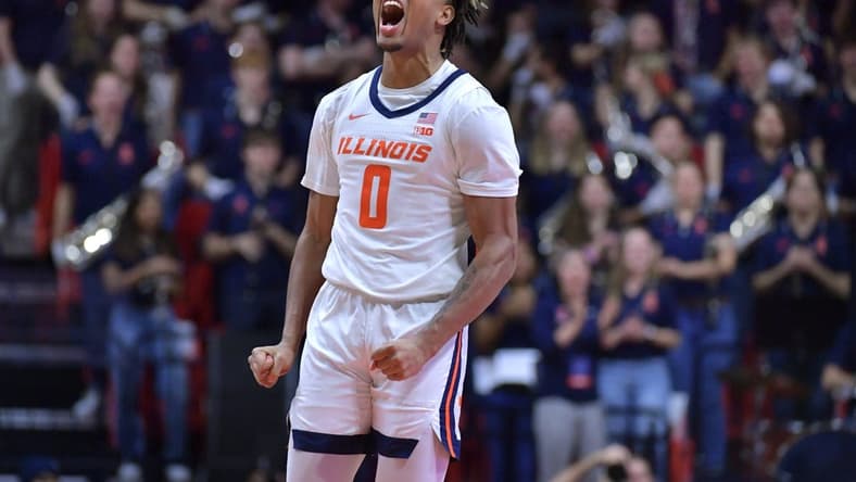 Jan 21, 2024; Champaign, Illinois, USA; Illinois Fighting Illini guard Terrence Shannon Jr. (0) reacts after scoring during the second half against the Rutgers Scarlet Knights at State Farm Center. Mandatory Credit: Ron Johnson-USA TODAY Sports