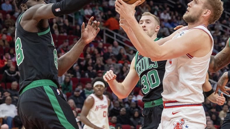 Jan 21, 2024; Houston, Texas, USA; Boston Celtics center Neemias Queta (88) and Houston Rockets center Jock Landale (2) fight over a rebound in the second quarter at Toyota Center. Mandatory Credit: Thomas Shea-USA TODAY Sports