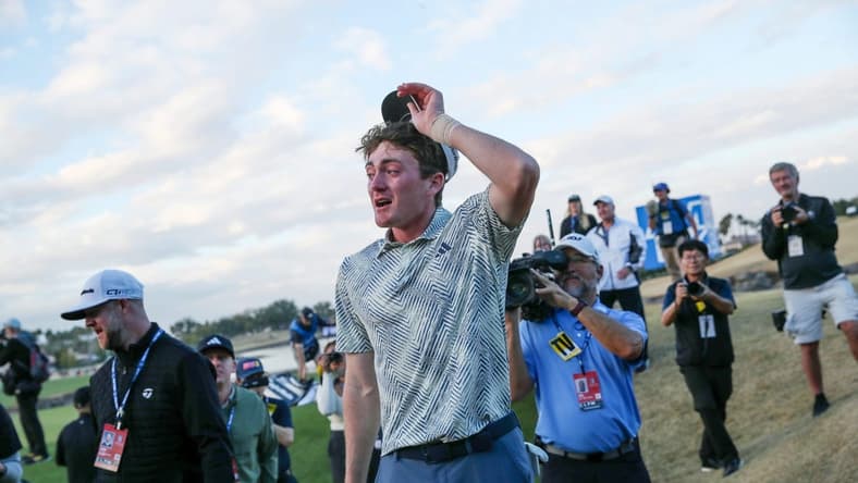 Nick Dunlap reacts after winning The American Express as the first amateur to win the PGA Tour event in 33 years in La Quinta, Calif., on Sunday, January 21, 2024.