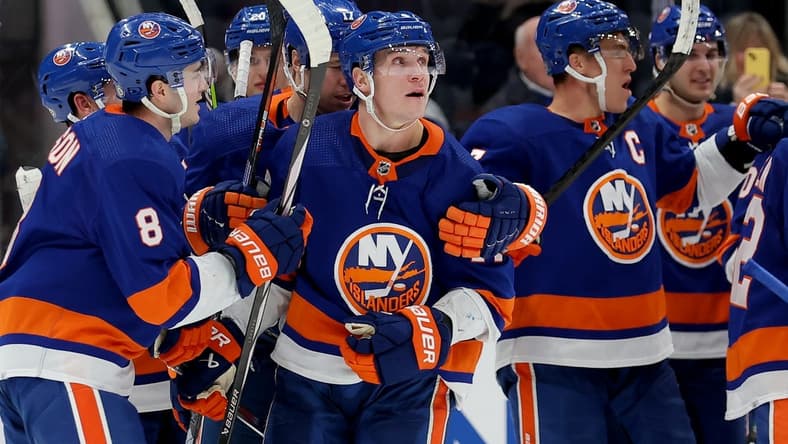 Jan 21, 2024; Elmont, New York, USA; New York Islanders center Bo Horvat (14) celebrates his game winning goal against the Dallas Stars with teammates during overtime at UBS Arena. Mandatory Credit: Brad Penner-USA TODAY Sports