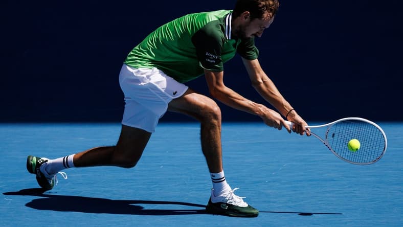 Jan 22, 2024; Melbourne, Victoria, Australia; Daniil Medvedev of Russia hits a shot against Nuno Borges of Portugal in the fourth round of the men s singles at the Australian Open in Melbourne. Mandatory Credit: Mike Frey-USA TODAY Sports