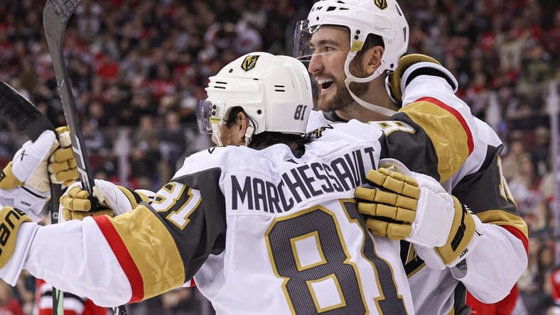 Jan 22, 2024; Newark, New Jersey, USA; Vegas Golden Knights center Nicolas Roy (10) celebrates his goal against the New Jersey Devils during the second period with right wing Jonathan Marchessault (81) at Prudential Center. Mandatory Credit: Vincent Carchietta-USA TODAY Sports