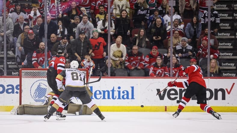 Jan 22, 2024; Newark, New Jersey, USA; New Jersey Devils right wing Tyler Toffoli (73) scores the game-winning goal in overtime against Vegas Golden Knights goaltender Logan Thompson (36) in front of Golden Knights right wing Jonathan Marchessault (81) and defenseman Luke Hughes (43) at Prudential Center. Mandatory Credit: Vincent Carchietta-USA TODAY Sports