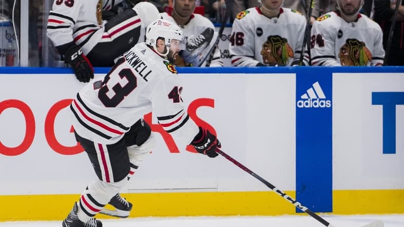 Jan 22, 2024; Vancouver, British Columbia, CAN; Chicago Blackhawks forward Colin Blackwell (43) handles the puck against the Vancouver Canucks in the third period at Rogers Arena. Canucks won 2-0. Mandatory Credit: Bob Frid-USA TODAY Sports