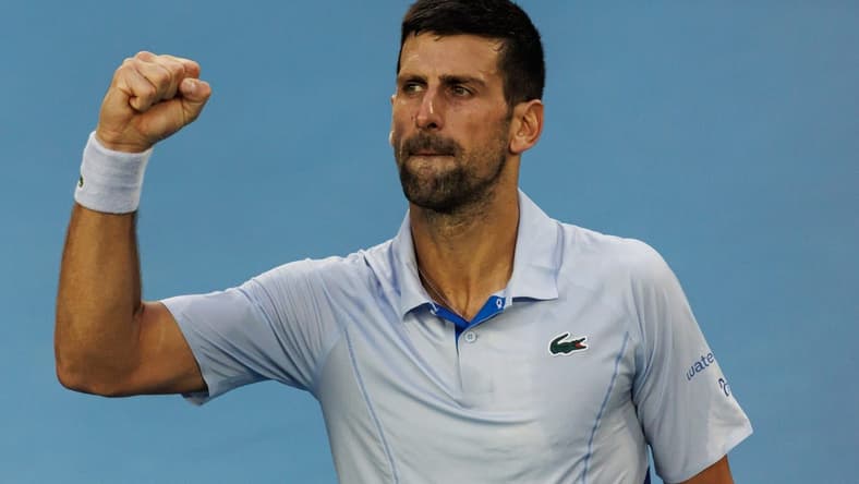 Jan 23, 2024; Melbourne, Victoria, Australia; Novak Djokovic of Serbia celebrates his victory against Taylor Fritz of the United States in the quarter final of the men s singles. Mandatory Credit: Mike Frey-USA TODAY Sports