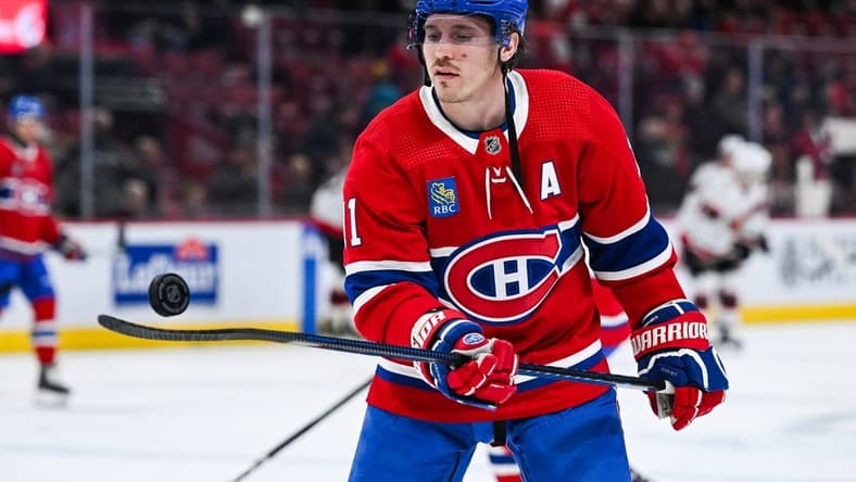 Jan 23, 2024; Montreal, Quebec, CAN; Montreal Canadiens right wing Brendan Gallagher (11) plays with a puck during a warm-up before the game against the Ottawa Senators at Bell Centre. Mandatory Credit: David Kirouac-USA TODAY Sports