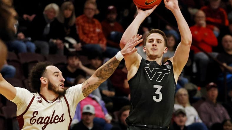 Jan 23, 2024; Blacksburg, Virginia, USA; Virginia Tech Hokies guard Sean Pedulla (3) shoots the ball against Boston College Eagles guard Jaeden Zackery (3) during the second half at Cassell Coliseum. Mandatory Credit: Peter Casey-USA TODAY Sports