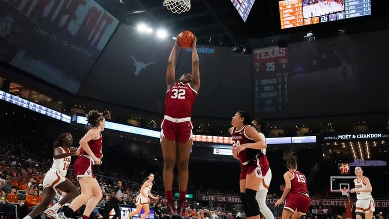 Oklahoma Sooners forward Sahara Williams (32) brings down a rebound during the first half of the Texas Longhorns' game against the Oklahoma Sooners at the Moody Center in Austin, Texas, Jan 24, 2024.