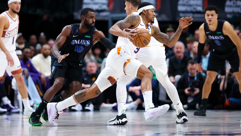 Jan 24, 2024; Dallas, Texas, USA; Phoenix Suns guard Bradley Beal (3) controls the ball as Dallas Mavericks forward Tim Hardaway Jr. (10) defends during the first half at American Airlines Center. Mandatory Credit: Kevin Jairaj-USA TODAY Sports