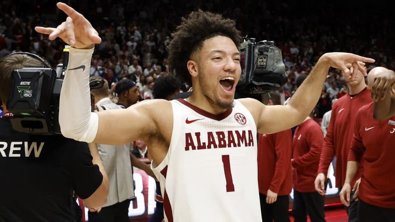 Jan 24, 2024; Tuscaloosa, Alabama, USA; Alabama Crimson Tide guard Mark Sears (1) celebrates the victory over the Auburn Tigers during the second half at Coleman Coliseum. Mandatory Credit: Butch Dill-USA TODAY Sports