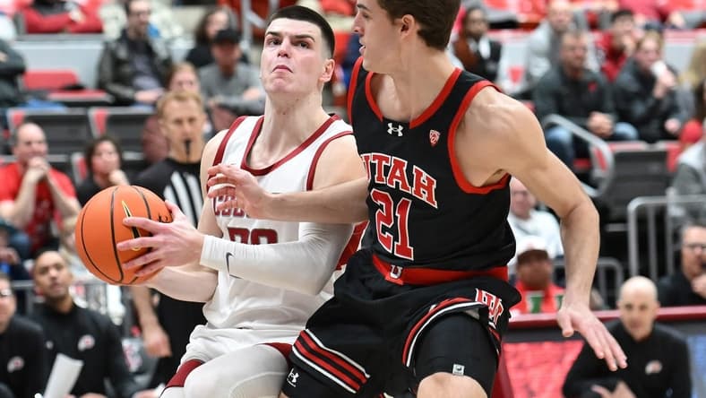 Jan 24, 2024; Pullman, Washington, USA; Washington State Cougars forward Andrej Jakimovski (23) shoots the ball against Utah Utes guard Luka Tarlac (21) in the first half at Friel Court at Beasley Coliseum. Mandatory Credit: James Snook-USA TODAY Sports