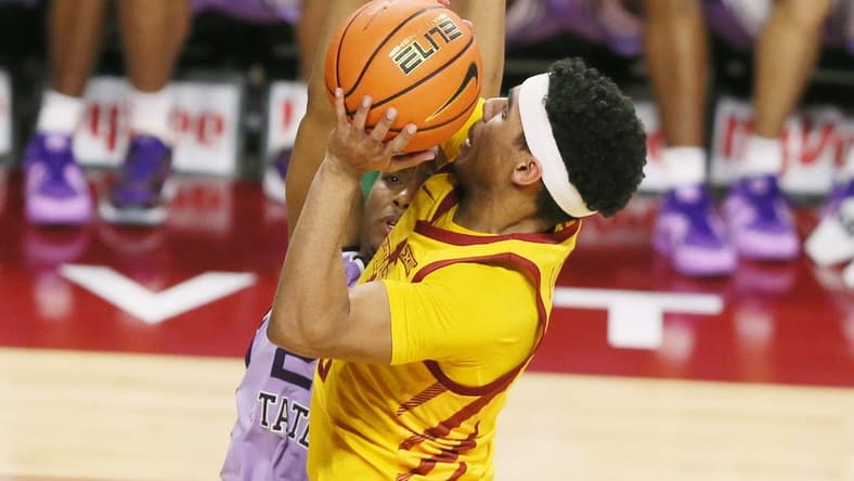 Iowa State Cyclones guard Tamin Lipsey (3) takes a shot around Kansas State Wildcats guard Tylor Perry (2) during the first half in the Big-12 conference showdown of an NCAA college basketball at Hilton Coliseum on Wednesday, Jan. 24, 2024, in Ames, Iowa.
