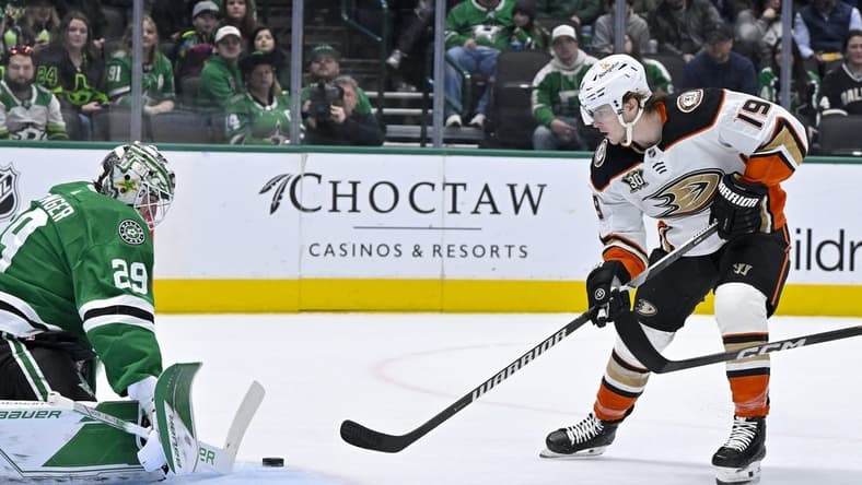 Jan 25, 2024; Dallas, Texas, USA; Dallas Stars goaltender Jake Oettinger (29) stops a shot by Anaheim Ducks right wing Troy Terry (19) during the first period at the American Airlines Center. Mandatory Credit: Jerome Miron-USA TODAY Sports