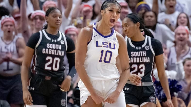 Jan 25, 2024; Baton Rouge, Louisiana, USA; LSU Tigers forward Angel Reese (10) reacts after a score against the South Carolina Gamecocks during the first half at Pete Maravich Assembly Center. Mandatory Credit: Matthew Hinton-USA TODAY Sports