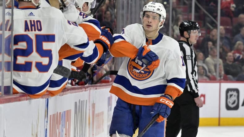 Jan 25, 2024; Montreal, Quebec, CAN; New York Islanders forward Matthew Barzal (13) celebrates with teammates after scoring a goal against the Montreal Canadiens during the third period at the Bell Centre. Mandatory Credit: Eric Bolte-USA TODAY Sports