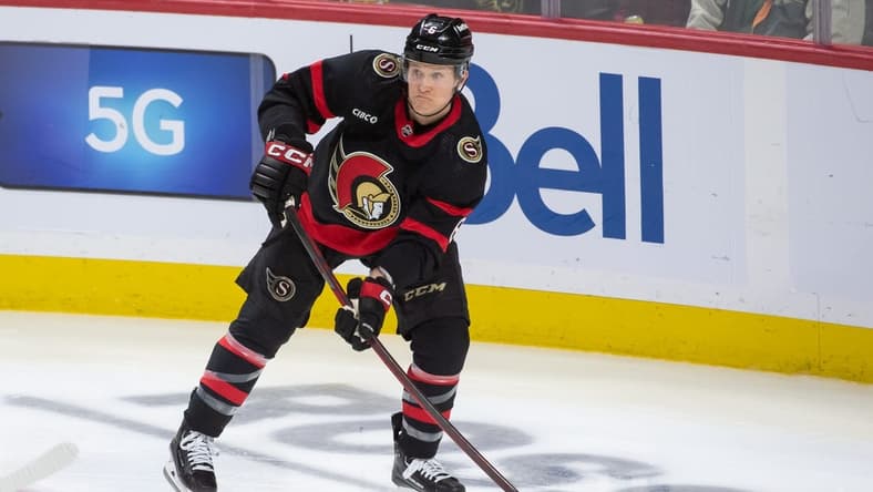 Jan 25, 2024; Ottawa, Ontario, CAN; Ottawa Senators defenseman Jakob Chychrun (6) shoots the puck in the third period against the Boston Bruins at the Canadian Tire Centre. Mandatory Credit: Marc DesRosiers-USA TODAY Sports