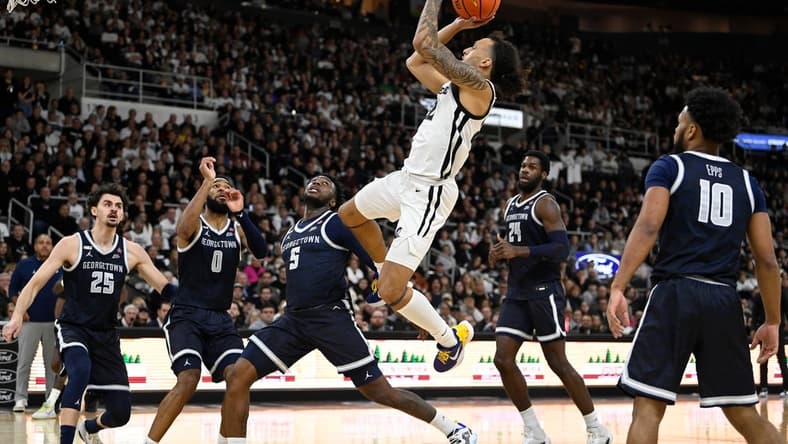 Jan 27, 2024; Providence, Rhode Island, USA; Providence Friars guard Devin Carter (22)  shoots during the first half against the Georgetown Hoyas at Amica Mutual Pavilion. Mandatory Credit: Eric Canha-USA TODAY Sports