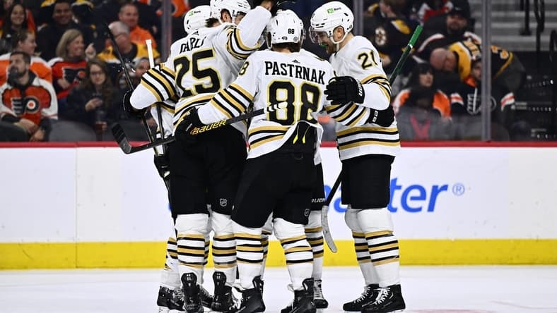 Jan 27, 2024; Philadelphia, Pennsylvania, USA; Boston Bruins right wing David Pastrnak (88) celebrates with teammates after scoring a goal against the Philadelphia Flyers in the first period at Wells Fargo Center. Mandatory Credit: Kyle Ross-USA TODAY Sports