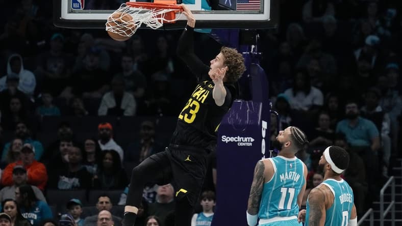 Jan 27, 2024; Charlotte, North Carolina, USA; Utah Jazz forward Lauri Markkanen (23) makes a dunk against the Charlotte Hornets during the second quarter at Spectrum Center. Mandatory Credit: Jim Dedmon-USA TODAY Sports