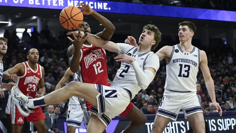 Jan 27, 2024; Evanston, Illinois, USA; Ohio State Buckeyes guard Evan Mahaffey (12) and Northwestern Wildcats forward Nick Martinelli (2) fight for a rebound during the first half  at Welsh-Ryan Arena. Mandatory Credit: Matt Marton-USA TODAY Sports