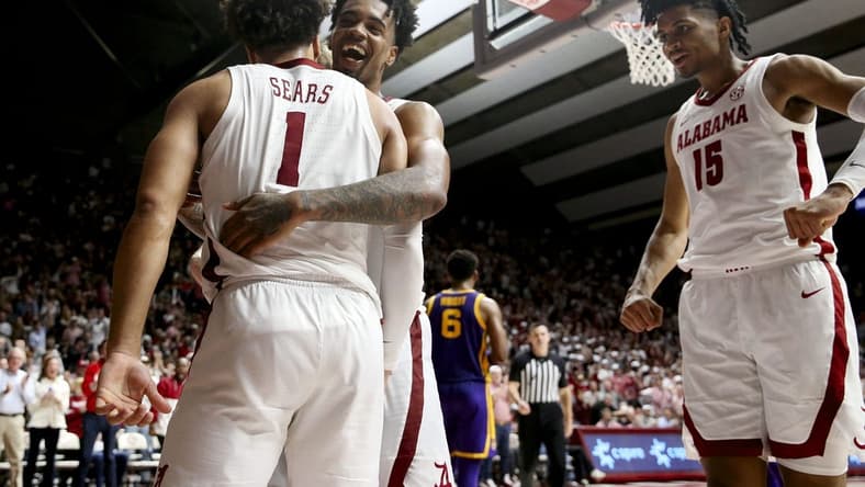Jan 27, 2024; Tuscaloosa, Alabama, USA;   Alabama guard Mark Sears (1), Alabama guard Aaron Estrada, and Alabama forward Jarin Stevenson (15) celebrate after Sears scored at Coleman Coliseum. Alabama defeated LSU 109-88. Mandatory Credit: Gary Cosby Jr.-USA TODAY Sports
