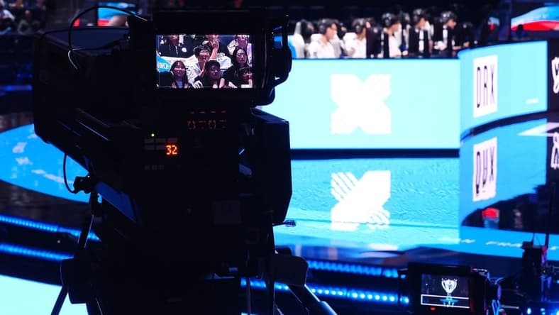 Nov 5, 2022; San Francisco, California, USA; A camera follow fans with DRX in the background during the League of Legends World Championships against T1 at Chase Center. Mandatory Credit: Kelley L Cox-USA TODAY Sports