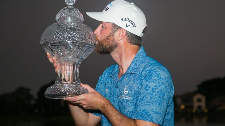 After winning the Honda Classic in a playoff round, Chris Kirk poses for a portrait with the Honda Classic trophy during the final round of the Honda Classic at PGA National Resort & Spa on Sunday, February 26, 2023, in Palm Beach Gardens, FL.