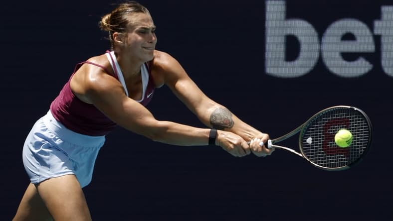 Mar 29, 2023; Miami, Florida, US; Aryna Sabalenka hits a backhand against Sorana Cirstea (ROU) (not pictured) in a women's singles quarterfinal on day ten of the Miami Open at Hard Rock Stadium. Mandatory Credit: Geoff Burke-USA TODAY Sports