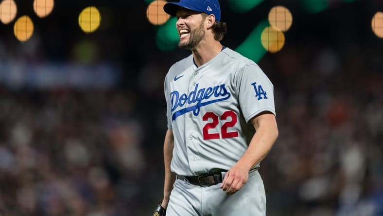 Apr 12, 2023; San Francisco, California, USA; Los Angeles Dodgers starting pitcher Clayton Kershaw (22) reacts after walking a San Francisco Giants batter during the fifth inning at Oracle Park. Mandatory Credit: John Hefti-USA TODAY Sports