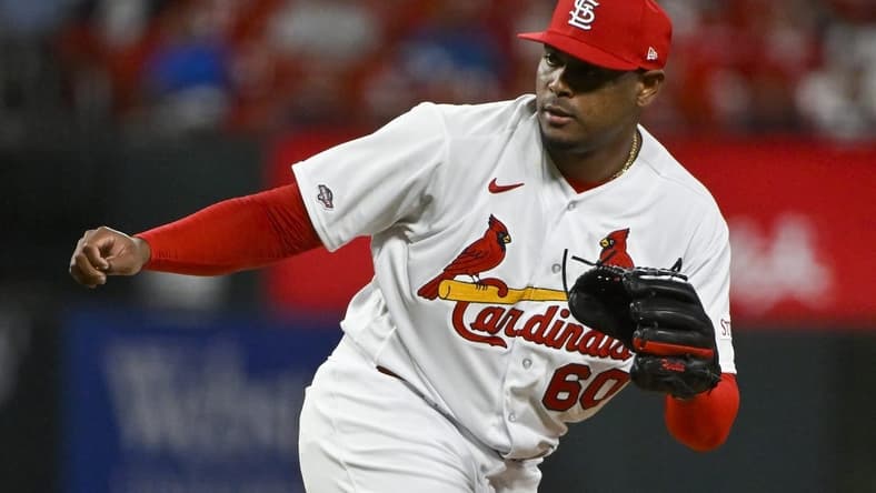 May 2, 2023; St. Louis, Missouri, USA; St. Louis Cardinals relief pitcher Guillermo Zuniga (60) pitches in his MLB debut against the Los Angeles Angels during the ninth inning at Busch Stadium. Mandatory Credit: Jeff Curry-USA TODAY Sports