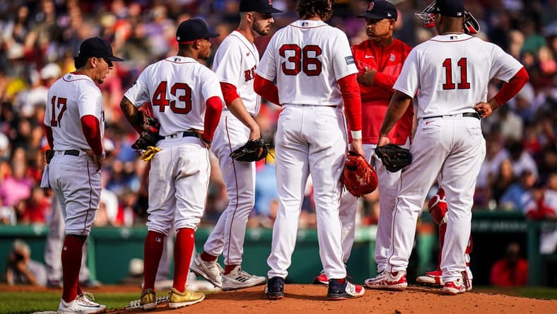 Aug 30, 2023; Boston, Massachusetts, USA; Boston Red Sox manager Alex Cora (13) brings in relief pitcher Joe Jacques (78) as they take on the Houston Astros in the third inning at Fenway Park. Mandatory Credit: David Butler II-USA TODAY Sports