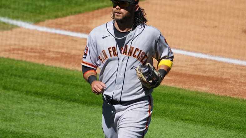 Sep 17, 2023; Denver, Colorado, USA; San Francisco Giants shortstop Brandon Crawford (35) leaves the field in the fourth inning against the Colorado Rockies at Coors Field. Mandatory Credit: Ron Chenoy-USA TODAY Sports