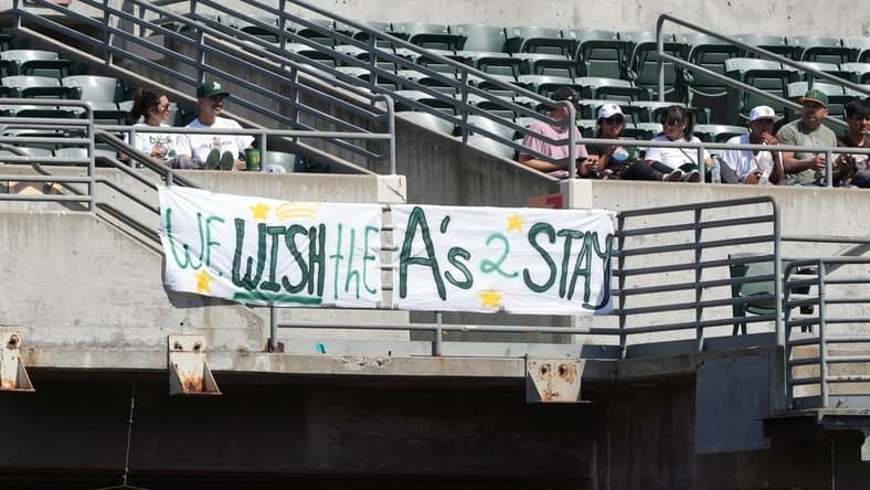 Sep 17, 2023; Oakland, California, USA; Oakland Athletics fans hang a sign in the right field bleachers during the fourth inning against the San Diego Padres at Oakland-Alameda County Coliseum. Mandatory Credit: Darren Yamashita-USA TODAY Sports