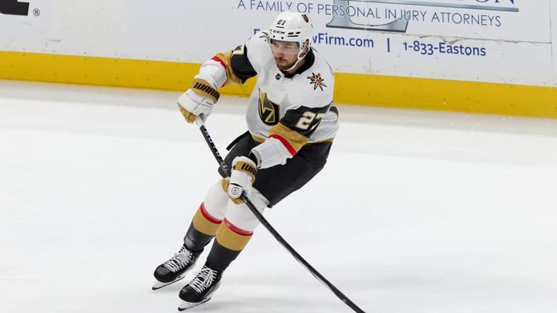 Nov 5, 2023; Anaheim, California, USA; Vegas Golden Knights defenseman Shea Theodore (27) passes during the third period against the Anaheim Ducks at Honda Center. Mandatory Credit: Jason Parkhurst-USA TODAY Sports