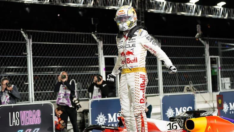Nov 18, 2023; Las Vegas, Nevada, USA; Red Bull Racing Honda driver Max Verstappen of Netherlands (1) celebrates after winning the Formula 1 Heineken Silver Las Vegas Grand Prix at the Las Vegas Strip Circuit. Mandatory Credit: Lucas Peltier-USA TODAY Sports