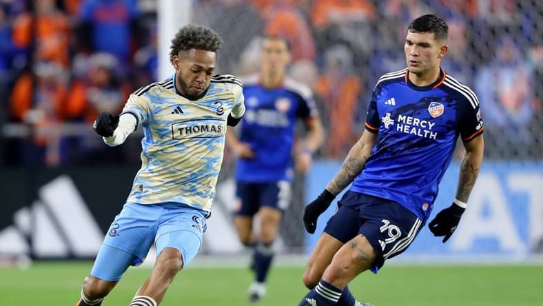 Nov 25, 2023; Cincinnati, Ohio, USA; Philadelphia Union forward Julian Carranza (9) dribbles the ball against FC Cincinnati forward Brandon Vazquez (19) during the second half in a MLS Cup Eastern Conference Semifinal match at TQL Stadium. Mandatory Credit: Joseph Maiorana-USA TODAY Sports