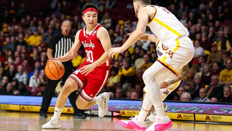 Dec 6, 2023; Minneapolis, Minnesota, USA; Nebraska Cornhuskers guard Keisei Tominaga (30) works around Minnesota Golden Gophers forward Parker Fox (23) during the second half at Williams Arena. Mandatory Credit: Matt Krohn-USA TODAY Sports