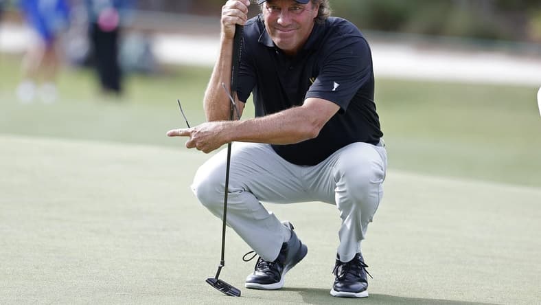Dec 8, 2023; Bradenton, Florida, USA; Team International s Stephen Ames lines up a putt during their morning round at The Concession Golf Club. Mandatory Credit: Jeff Swinger-USA TODAY Sports