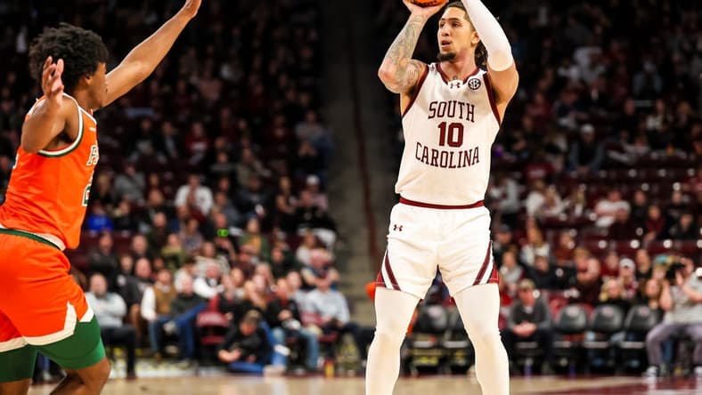 Dec 30, 2023; Columbia, South Carolina, USA; South Carolina Gamecocks guard Myles Stute (10) attempts a three point basket against the Florida A&M Rattlers in the first quarter at Colonial Life Arena. Mandatory Credit: Jeff Blake-USA TODAY Sports
