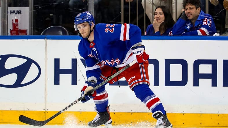 Jan 2, 2024; New York, New York, USA; New York Rangers center Jonny Brodzinski (22) looks to pass against the Carolina Hurricanes during the third period at Madison Square Garden. Mandatory Credit: Danny Wild-USA TODAY Sports