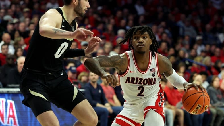 Jan 4, 2024; Tucson, Arizona, USA; Arizona Wildcats guard Caleb Love (2) drives to the net against Colorado Buffaloes guard Luke O'Brien (0) during the second half at McKale Center. Mandatory Credit: Zachary BonDurant-USA TODAY Sports