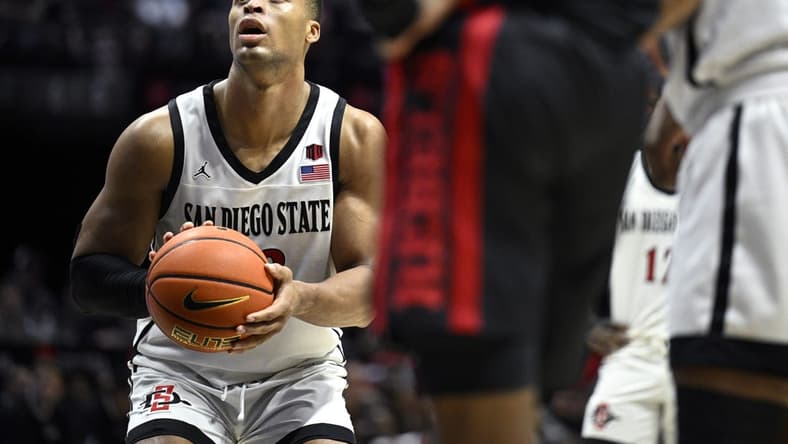 Jan 6, 2024; San Diego, California, USA; San Diego State Aztecs forward Jaedon LeDee (13) shoots a free throw during the second half against the UNLV Rebels at Viejas Arena. Mandatory Credit: Orlando Ramirez-USA TODAY Sports