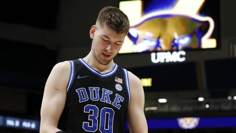 Jan 9, 2024; Pittsburgh, Pennsylvania, USA; Duke Blue Devils center Kyle Filipowski (30) reacts as he leaves the court after defeating the Pittsburgh Panthers at the Petersen Events Center. Duke won 75-53. Mandatory Credit: Charles LeClaire-USA TODAY Sports