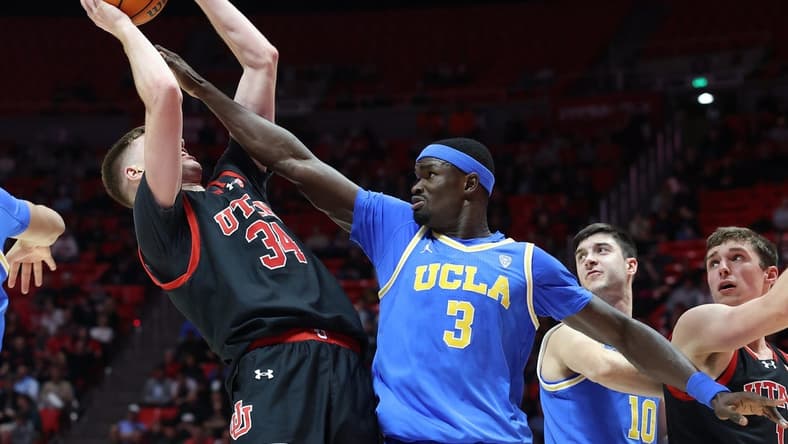 Jan 11, 2024; Salt Lake City, Utah, USA; UCLA Bruins forward Adem Bona (3) defends the shot of Utah Utes center Lawson Lovering (34) during the second half at Jon M. Huntsman Center. Mandatory Credit: Rob Gray-USA TODAY Sports