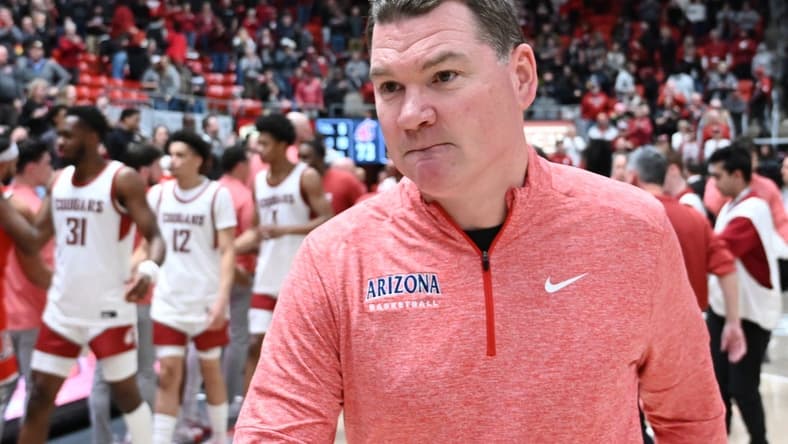Jan 13, 2024; Pullman, Washington, USA; Arizona Wildcats head coach Tommy Lloyd walks off the court after a game against the Washington State Cougars at Friel Court at Beasley Coliseum. Mandatory Credit: James Snook-USA TODAY Sports